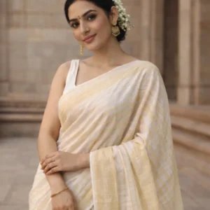 Beige and light yellow colour pure linen saree with very thin border in black colour and silver zari detailing at the aanchal