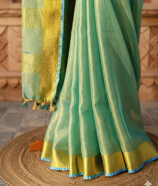 Turquoise Blue tissue linen Saree with golden zari border - Image 2