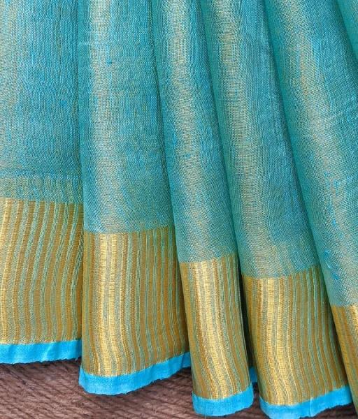 Turquoise Blue tissue linen Saree with golden zari border - Image 3