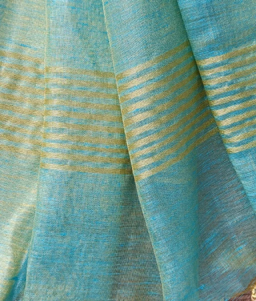 Turquoise Blue tissue linen Saree with golden zari border - Image 4